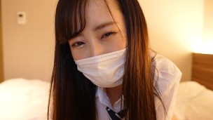 Japanese girl gives a guy a handjob wearing a sailor suit