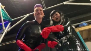 Trailer – Latex Dommes Invite You To Suck Their Huge Strap Ons