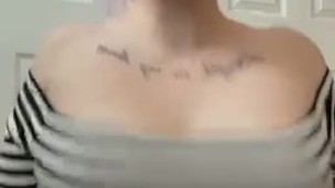 Tattooed alt girl shakes and plays with her boobs