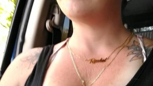 Girl films up her own black minidress and teases with her panties in public while I am driving